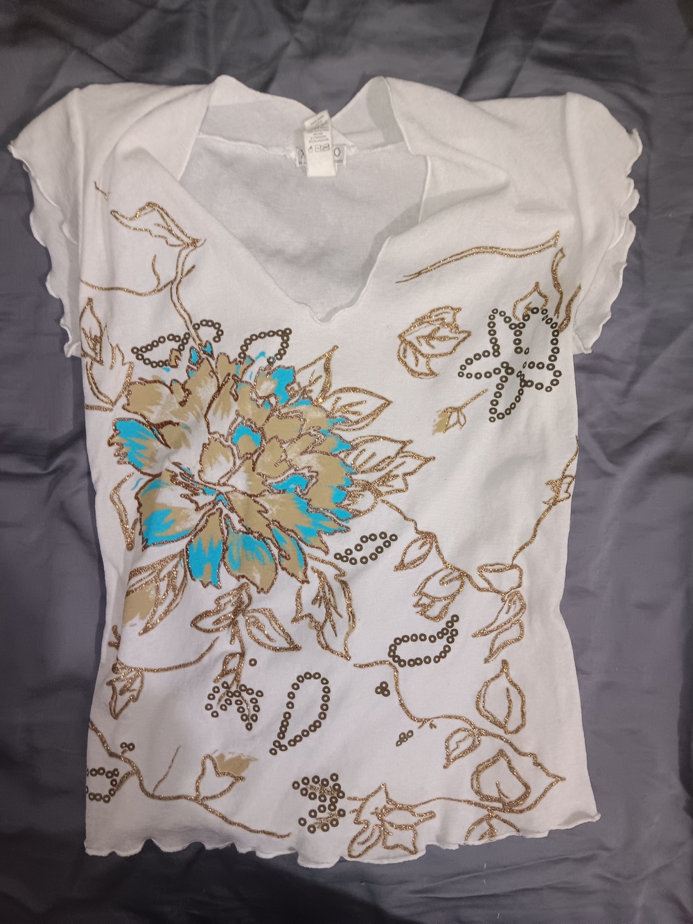 XOXO White V-Neck Floral Top with Turquoise and Gold Accents